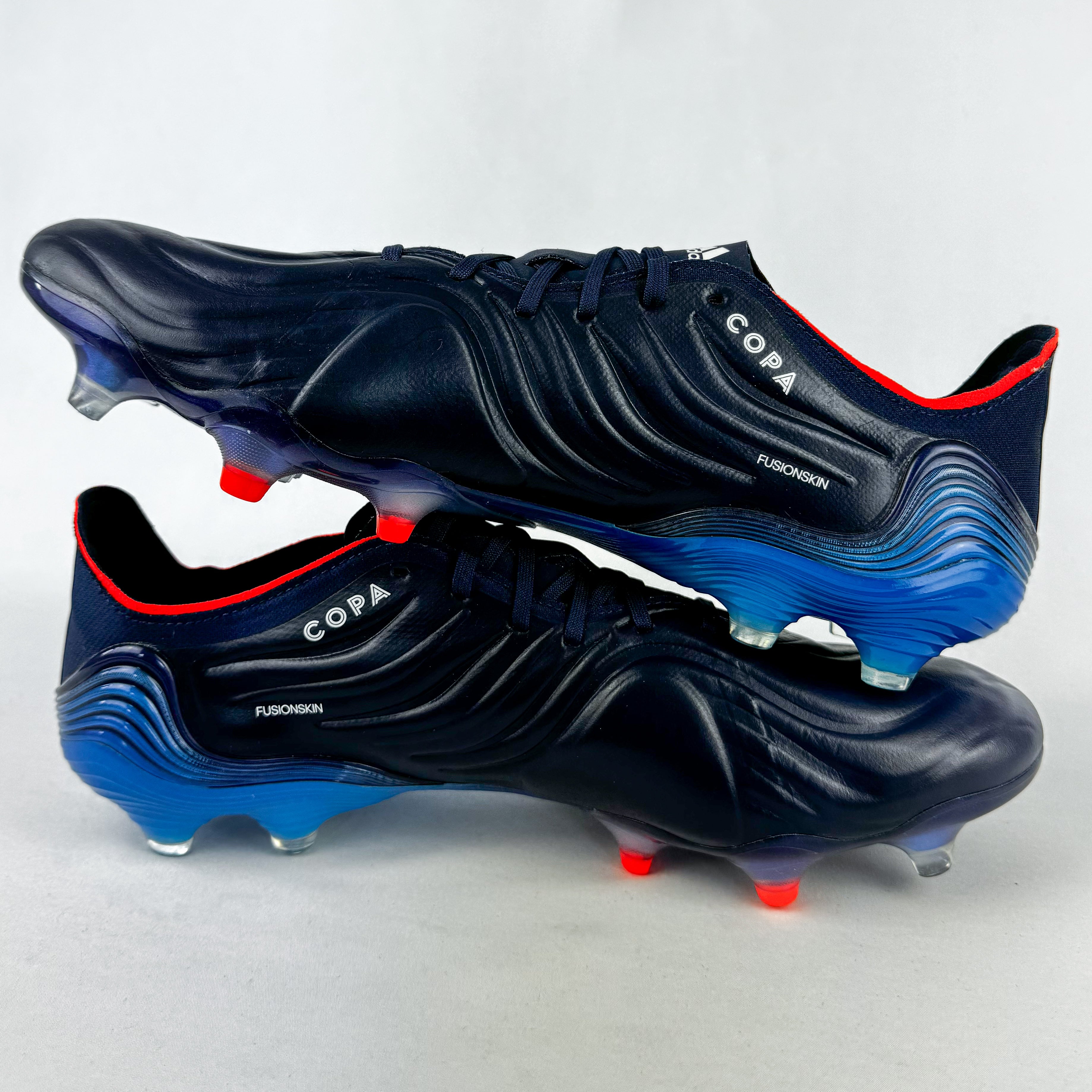 navy blue adidas soccer cleats